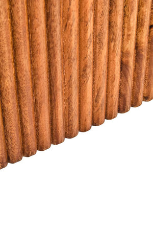 Close-up of the vertical reeding on the Hawthorn Mango Wood Oval Dining Table base.