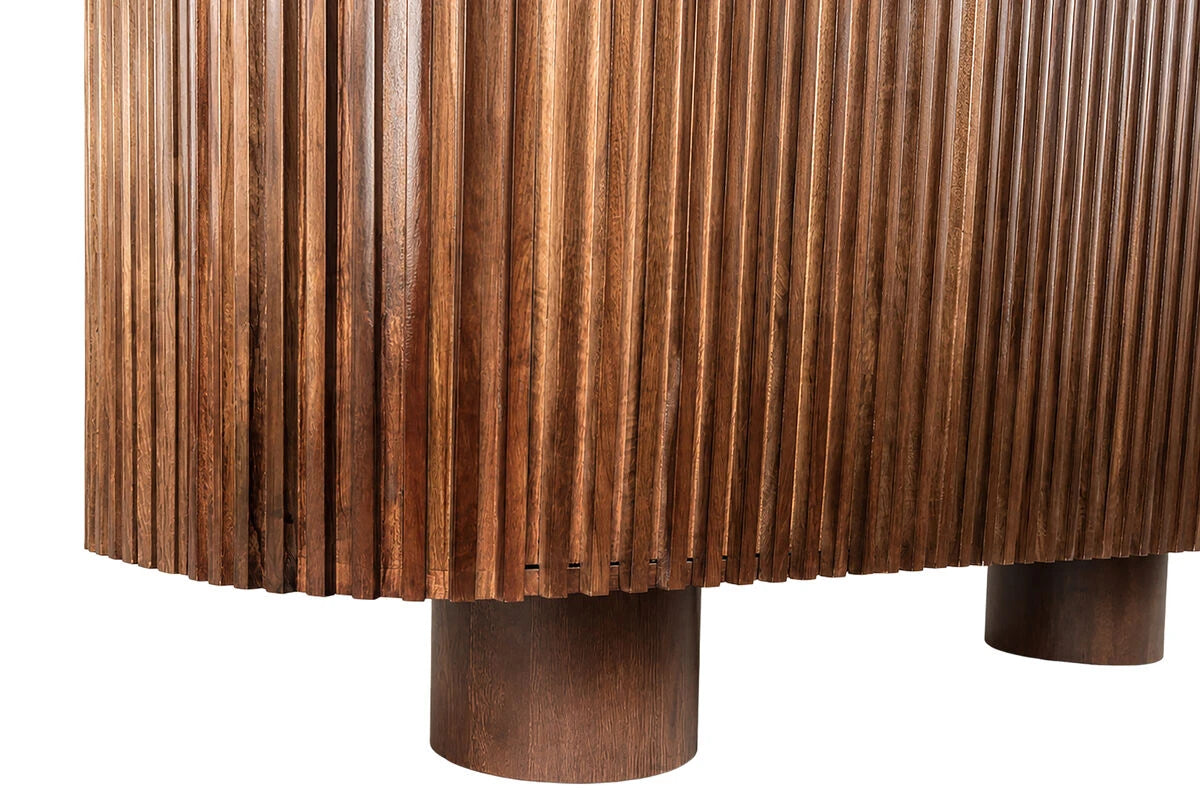 Close-up of the ribbed mango wood slats and round pillar foot on the Solmere sideboard