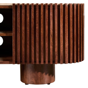 Close-up of the ribbed mango wood slats and pillar foot on the Solmere media unit