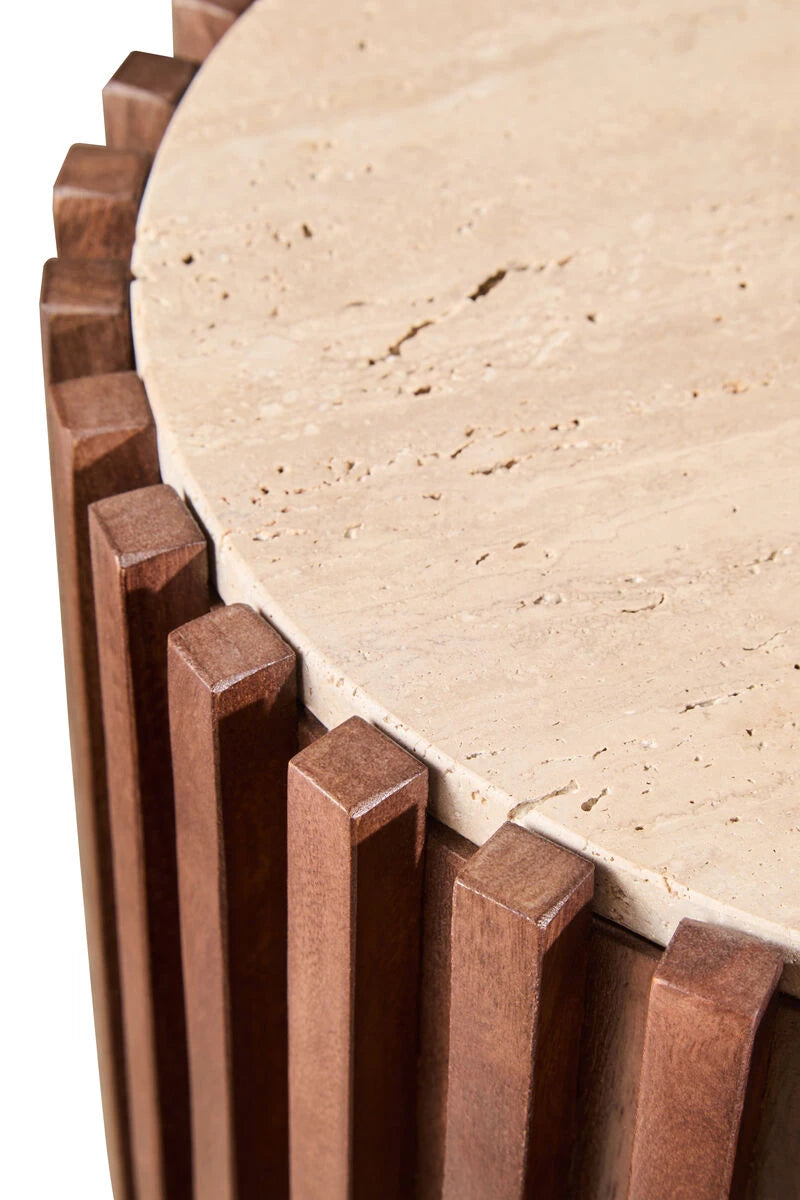 Close-up of the travertine top and ribbed mango wood edge on the Solmere media unit