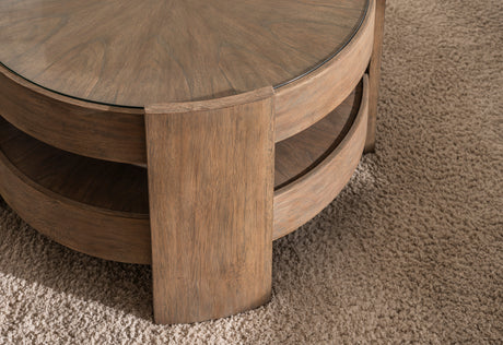 Wooden round coffee table on a carpeted floor