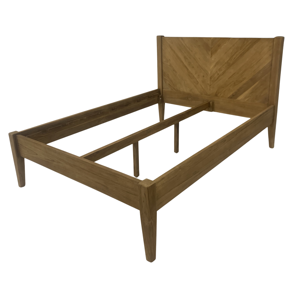 The Ashcombe King Size Bed frame from an angle, showing the reclaimed teak rails, centre support and chevron headboard.