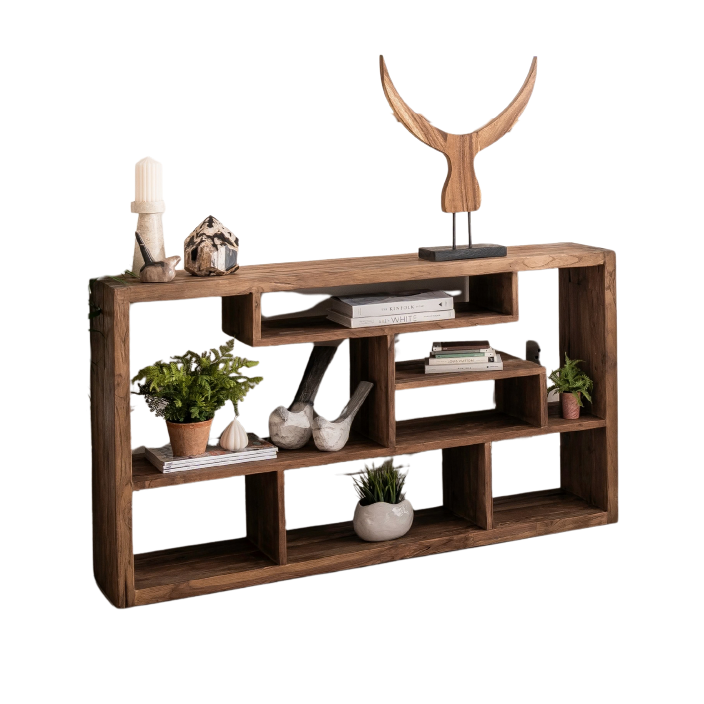 A rustic brown wooden cubby shelf with decorative items including books, small potted plants, ceramic vases, and a horned bull head sculpture, shown against a plain white background.