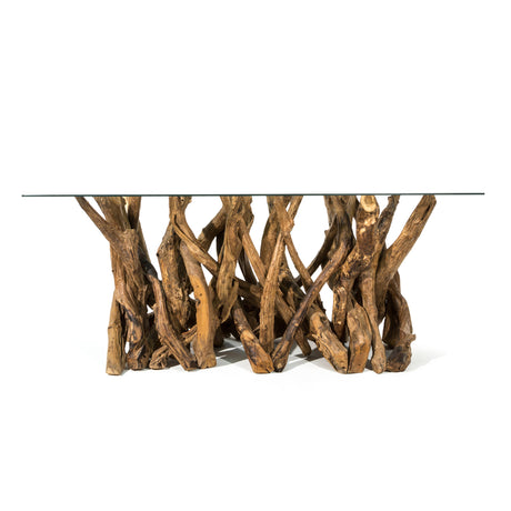 Teak root dining table with a glass top on a white background