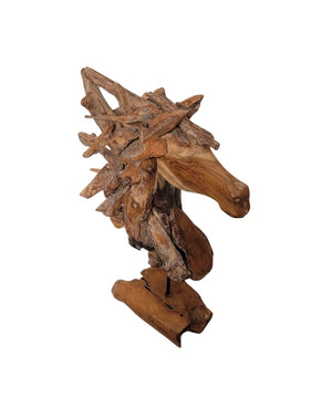Decorative wooden horse head sculpture on a white background