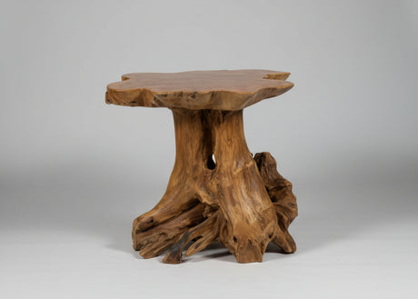 Wooden side table with natural, organic design on a gray background