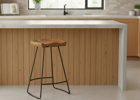 Wooden bar stool with black legs in a kitchen setting