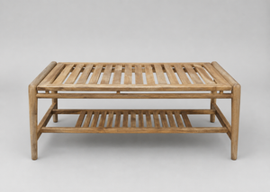 A rectangular wooden slatted coffee table with a lower shelf, shown against a neutral light grey studio background.