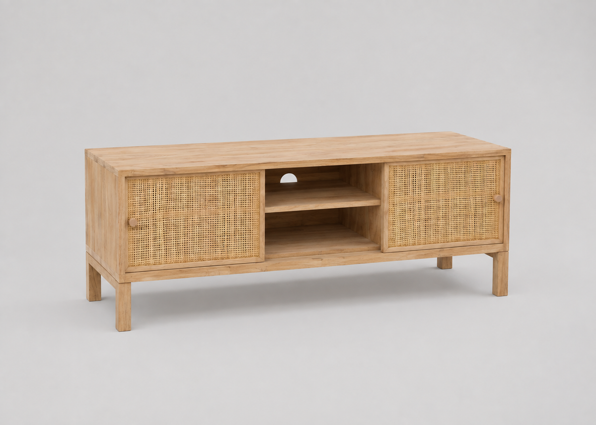 A light natural wood TV stand or media console with woven rattan panel doors and an open centre shelf, photographed on a plain light grey studio background.