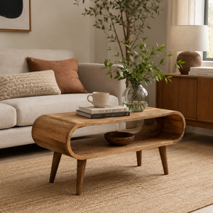 Wooden nordic style coffee table with decor items in a living room setting