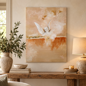 Ascend painting of a winged ivory figure in warm ochre and burnt orange above a rustic console table with a stone lamp and olive branches