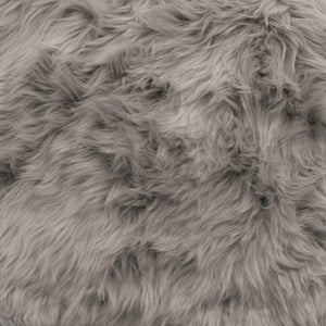 Close-up of the long, soft pebble-grey wool on the Pebble Sheepskin Cushion