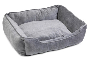 Velvet Grey Dog Bed in soft grey velvet with piped edges and a removable inner cushion, on a white background