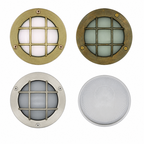 Four round metallic light fixtures with grid designs on a white background