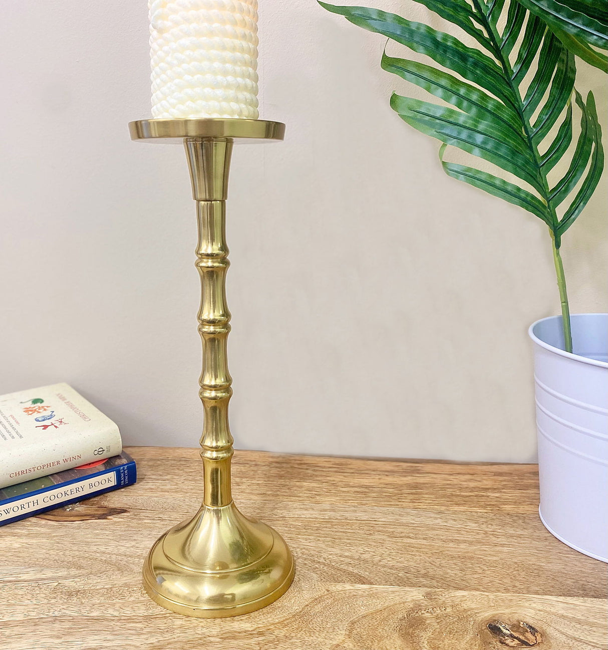 A Pair Of Gold Pillar Candlesticks