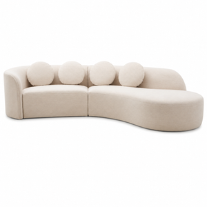 Sorena curved cream linen sofa on a white background