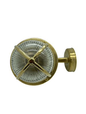 View from below of a brass outdoor lantern with clear glass center on a white background
