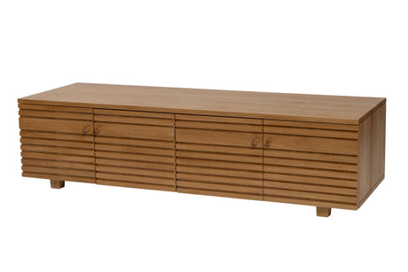 Solid oak media unit with slatted detail on a white background
