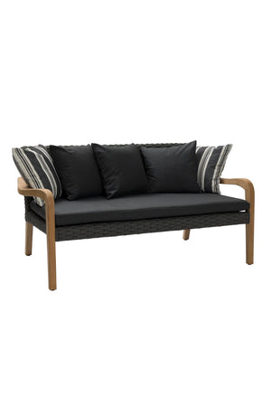 Outdoor patio loveseat with black cushions, a woven black base, and light brown wooden arms and legs, shown on a plain white background.