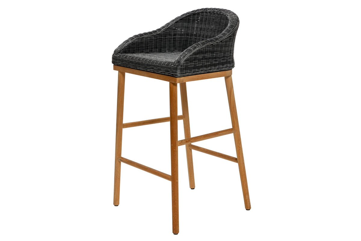 Outdoor bar stool with wicker seat and wooden legs on a white background