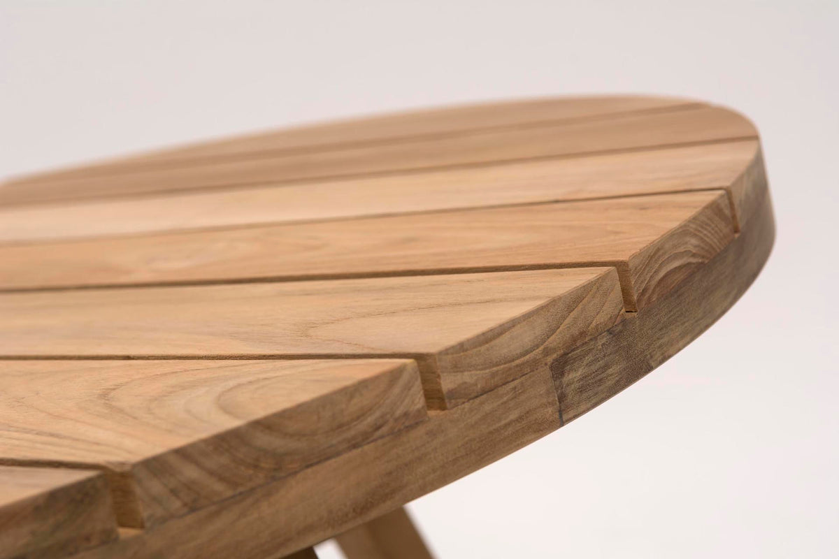 Wooden table top with a light brown finish on a white background