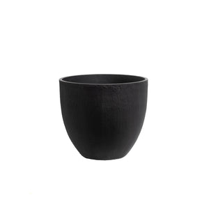Black ceramic planter on a white background